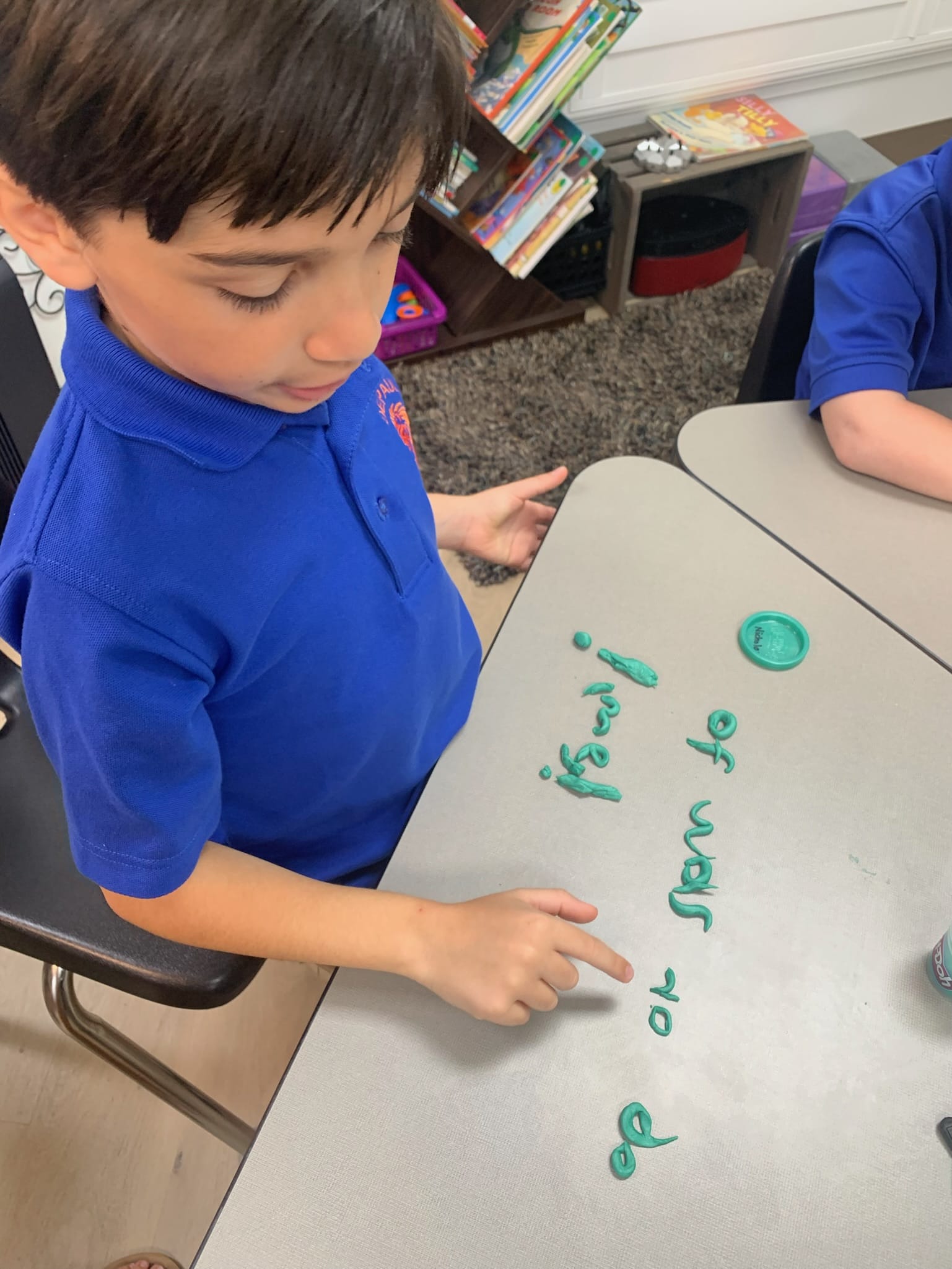 dyslexia-focused academic programs Jacksonville FL - A classroom scene showing students engaged in a dyslexia-focused academi