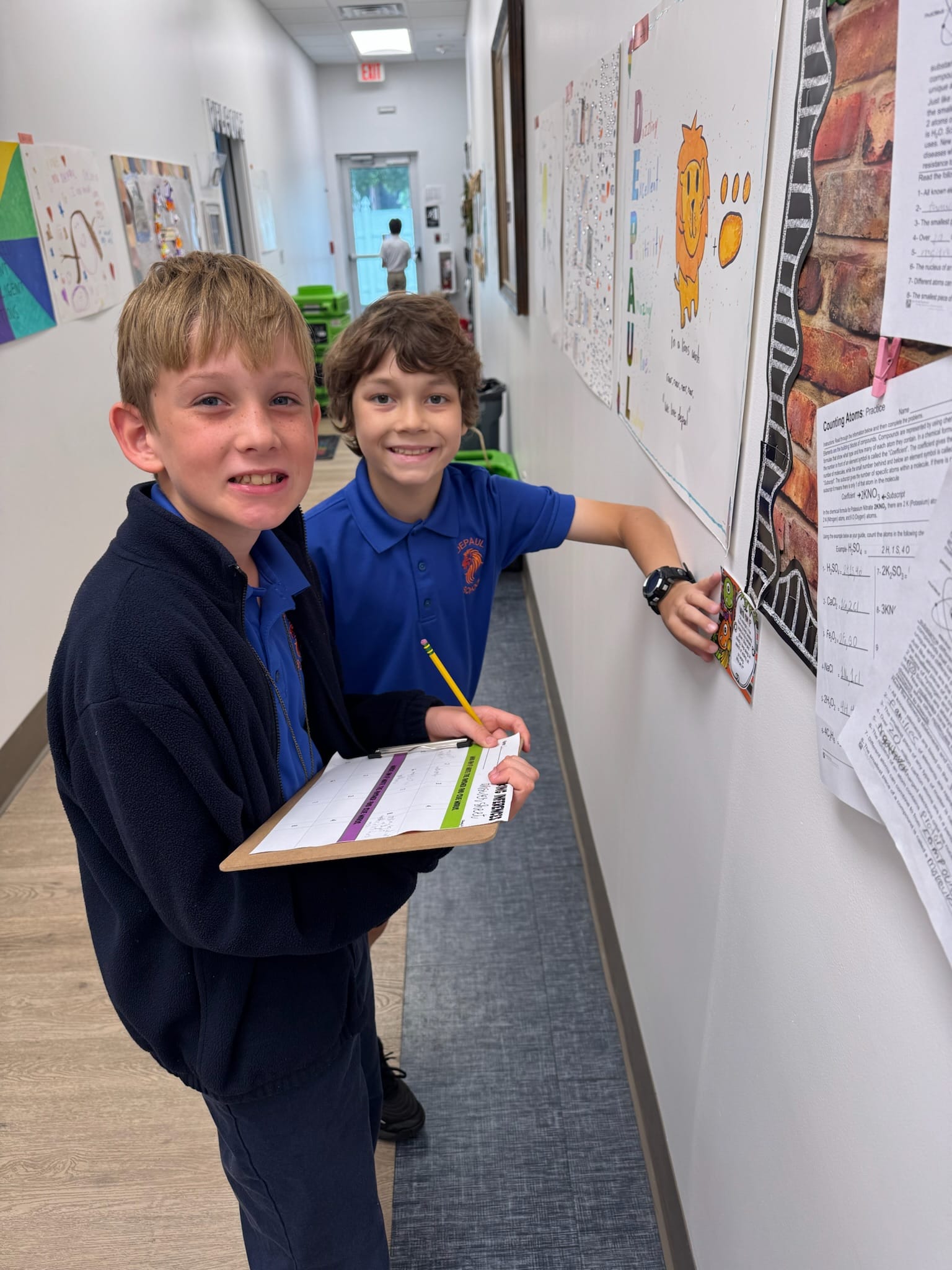 Classroom setting showing students engaged in dyslexia-focused academic programs Jacksonville FL, with books and learning mat
