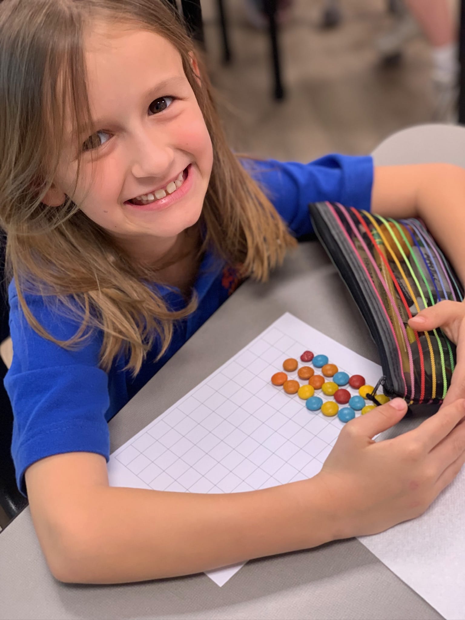 A vibrant classroom scene with students engaged in a hands-on learning activity, showcasing collaboration and creativity.