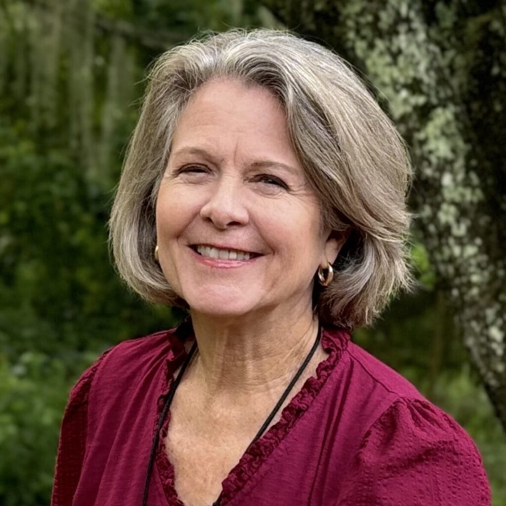 Nancy Barnard, a member of the board of directors Jacksonville FL, smiling in a professional setting.